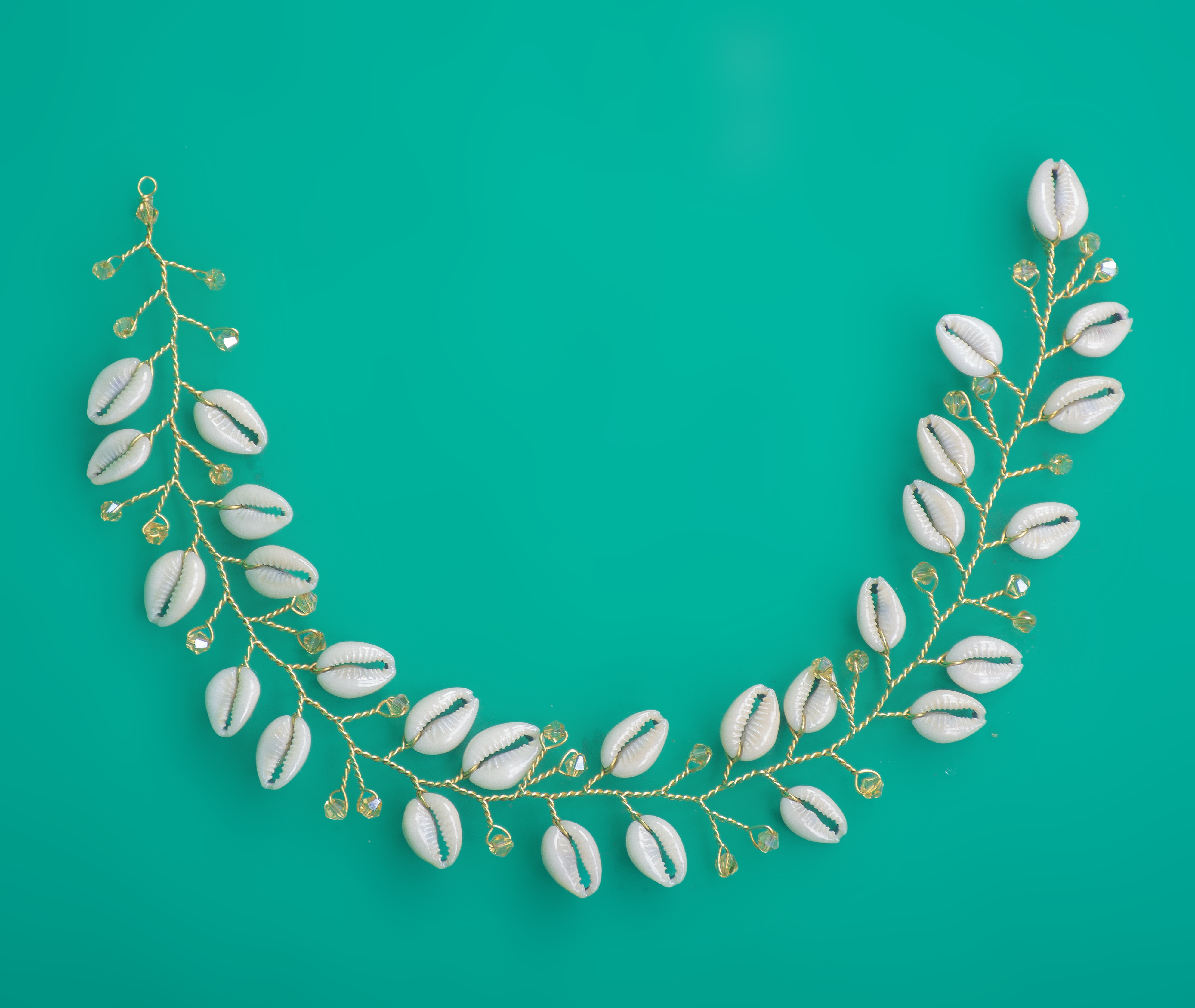 Cowrie shells and gold hairvine