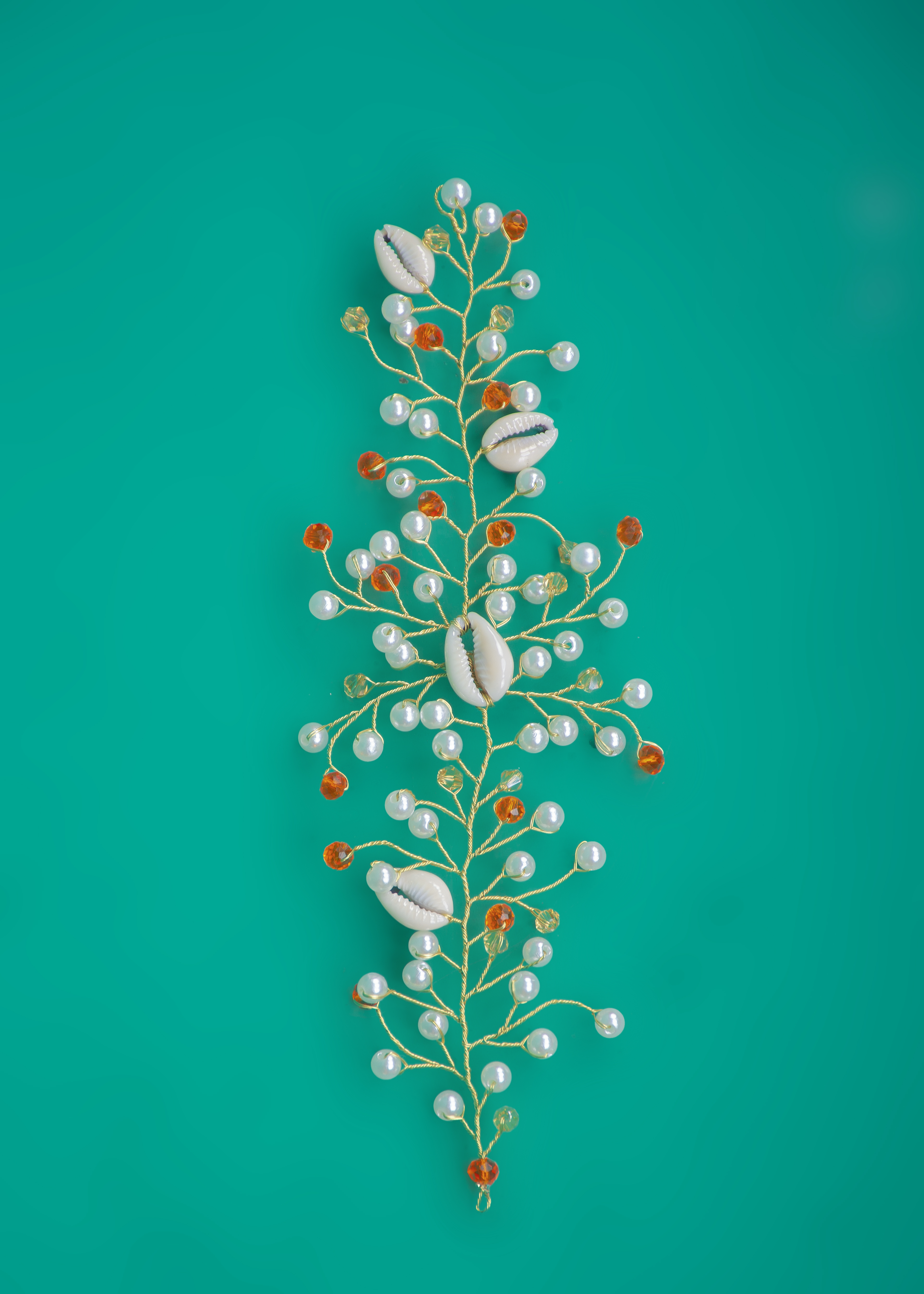 Orange and white with cowrie shells